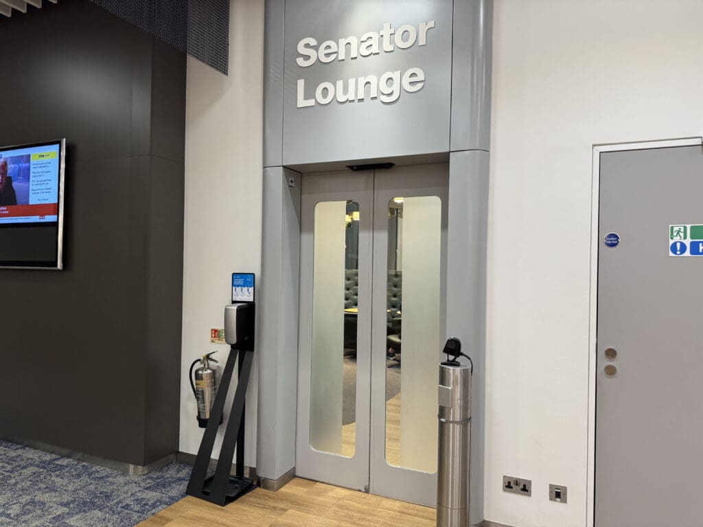 a glass doors with a sign on the front