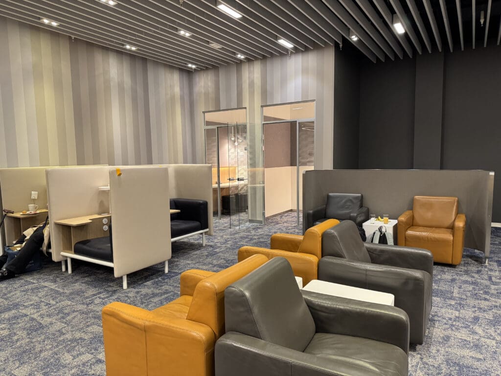 a room with chairs and tables