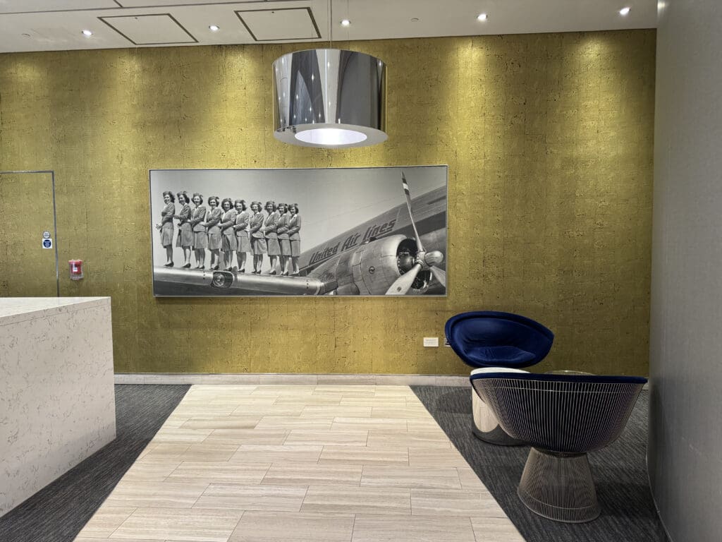 a room with a picture of soldiers on the wall