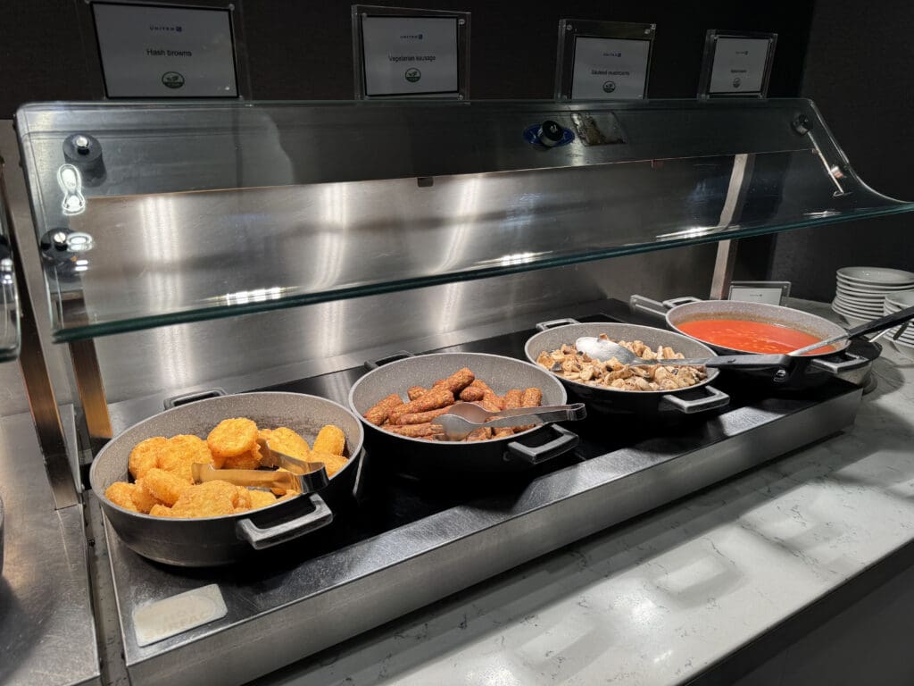 a row of bowls of food