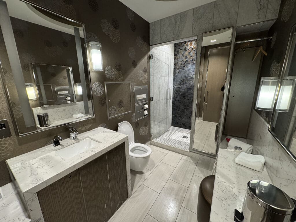 a bathroom with a sink and mirror