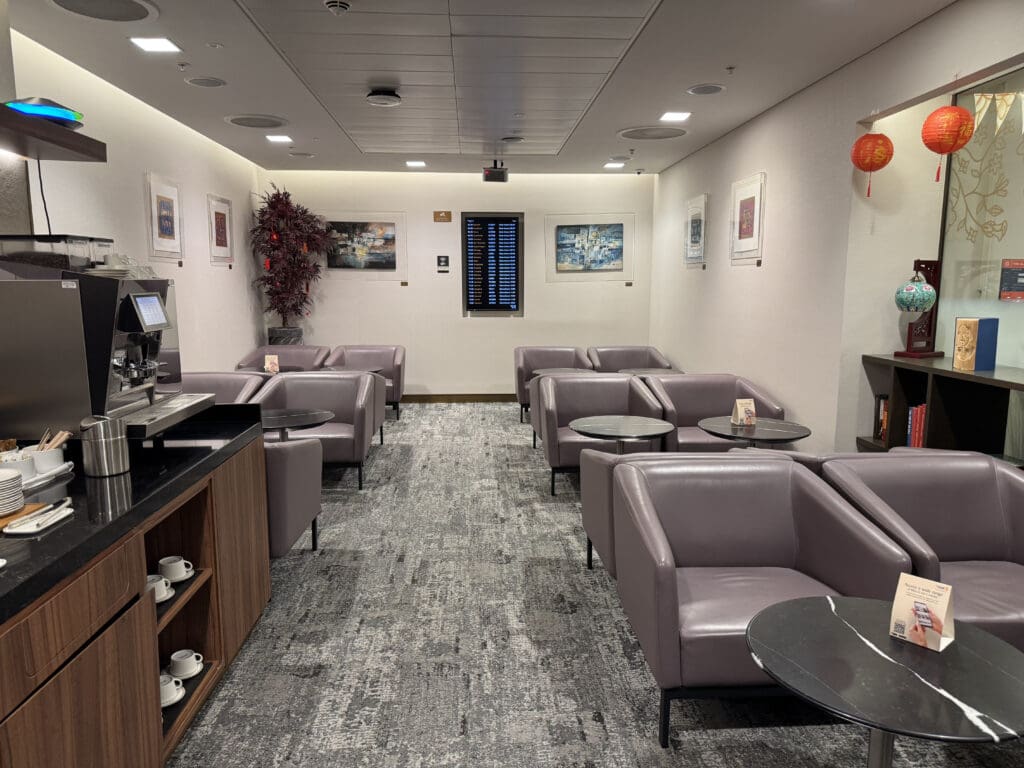 a room with chairs and tables