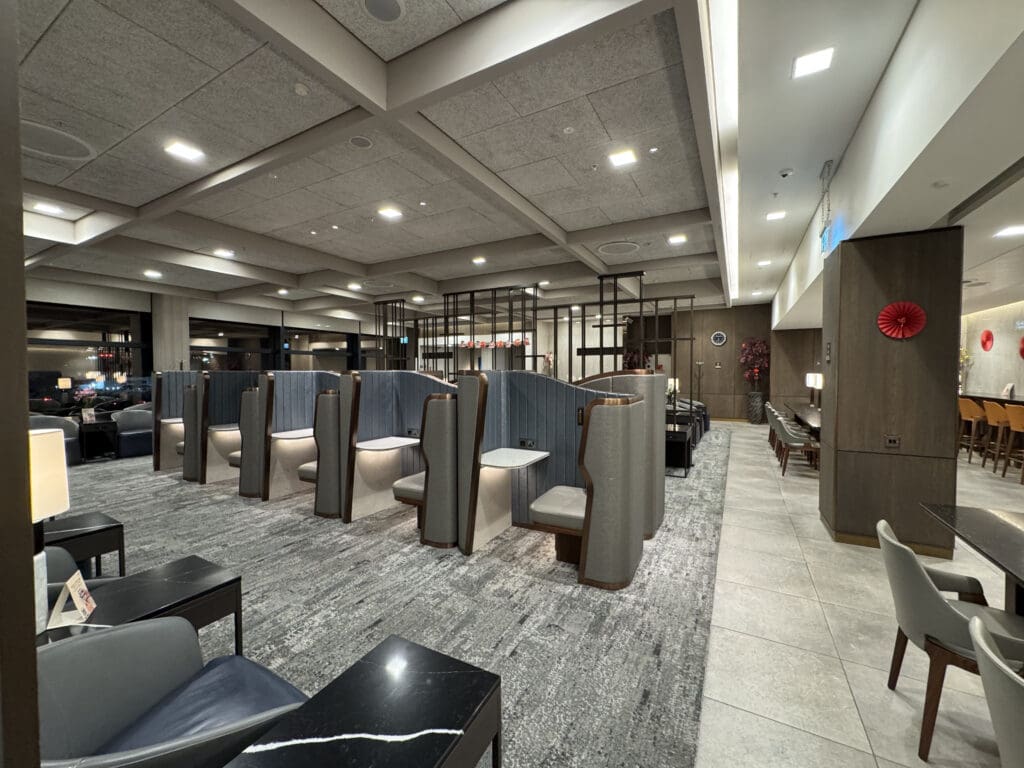 a room with chairs and a wall