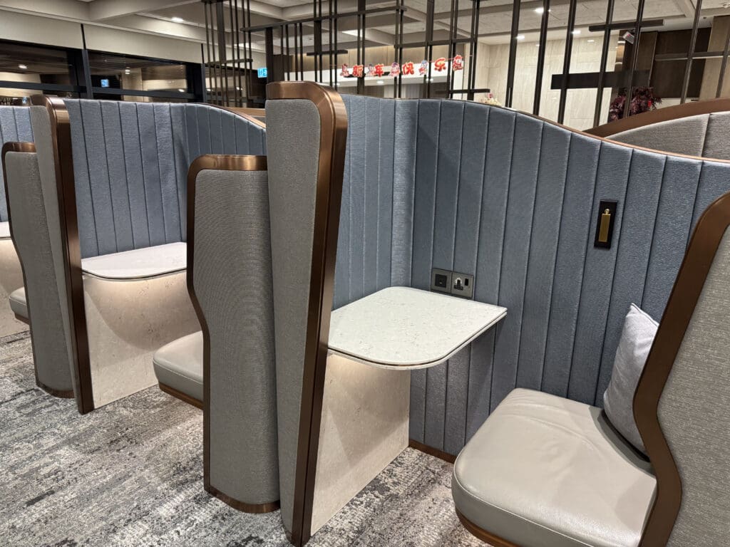 a booth with a table and chairs