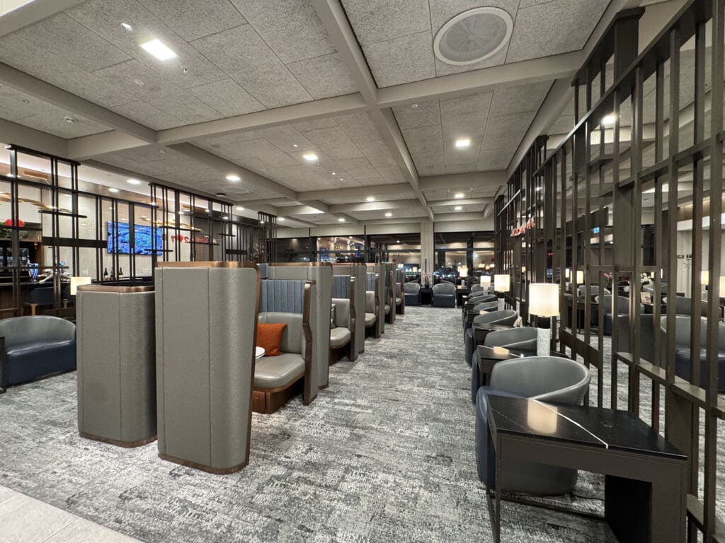 a room with chairs and tables