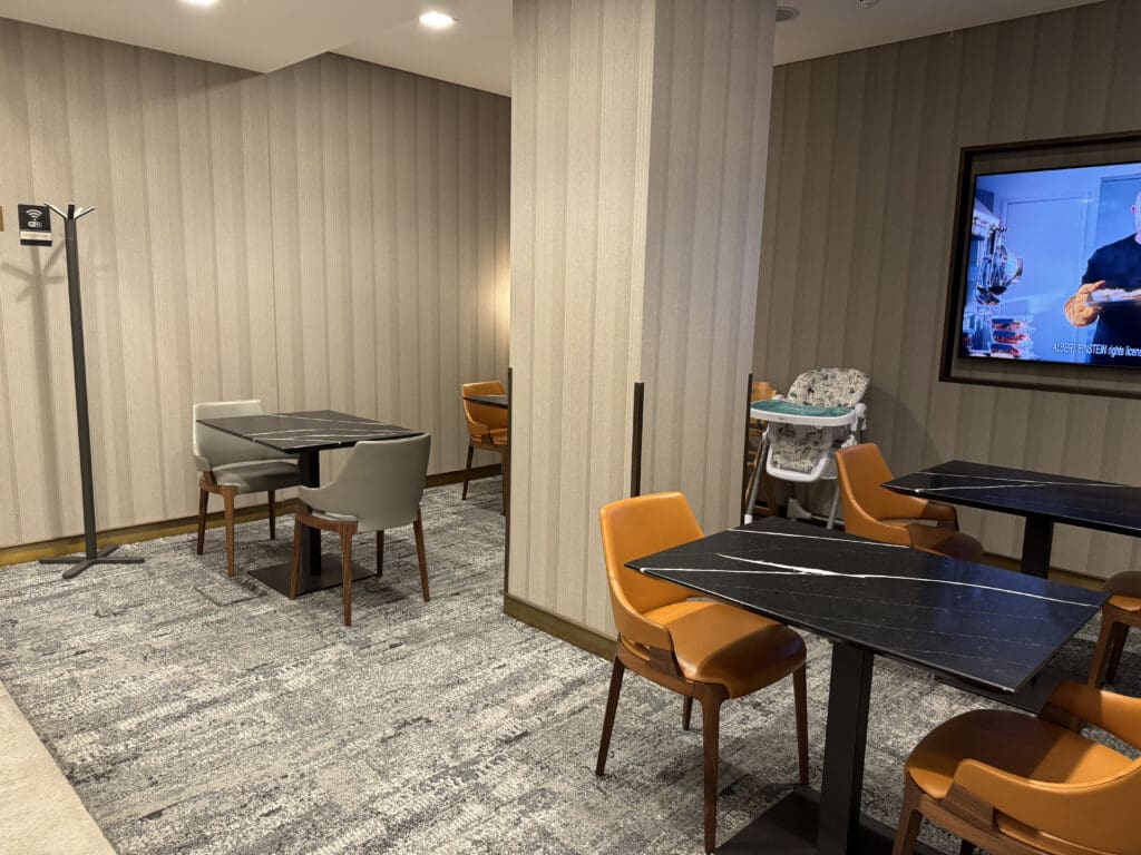 a room with tables and chairs