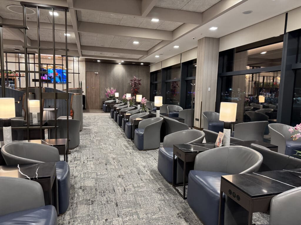 a room with chairs and tables