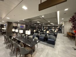 a room with a marble table and chairs