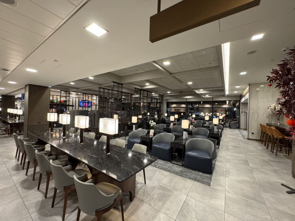 a room with a marble table and chairs