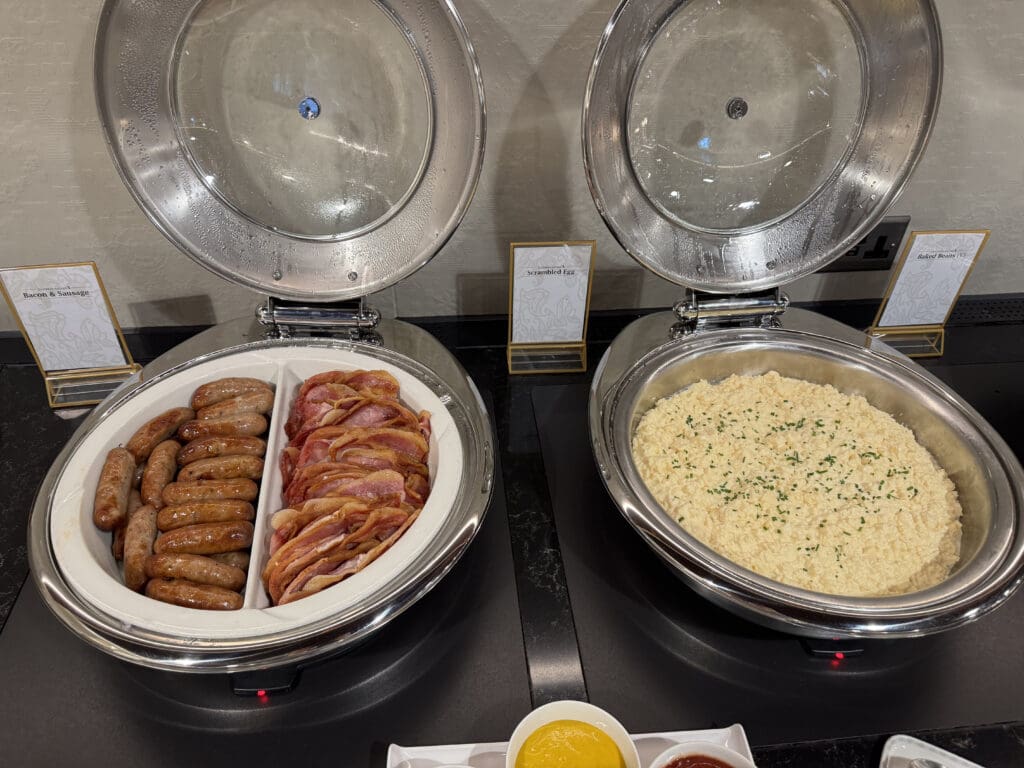 food in a buffet with a couple of bowls of food