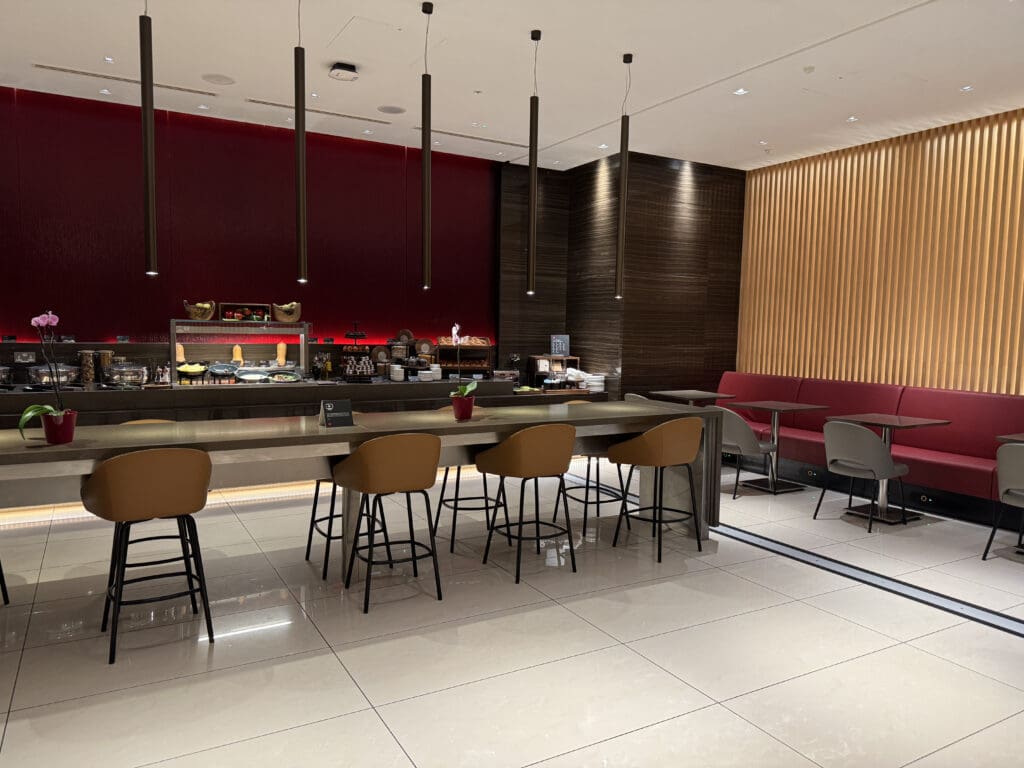 a room with a long table and chairs