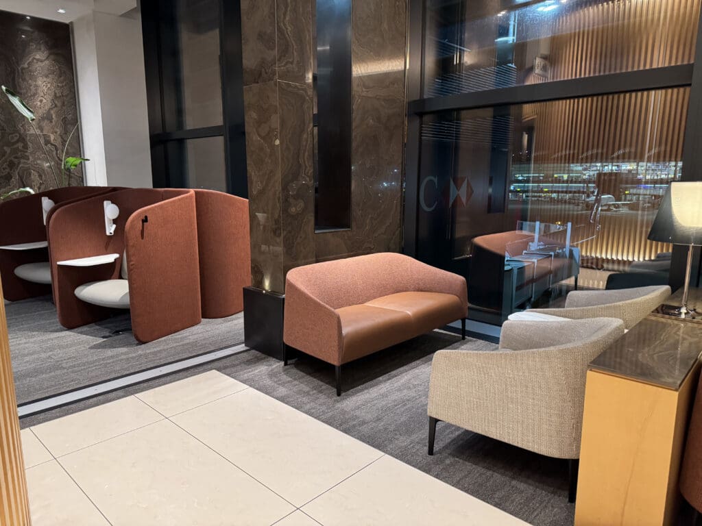 a room with chairs and a couch