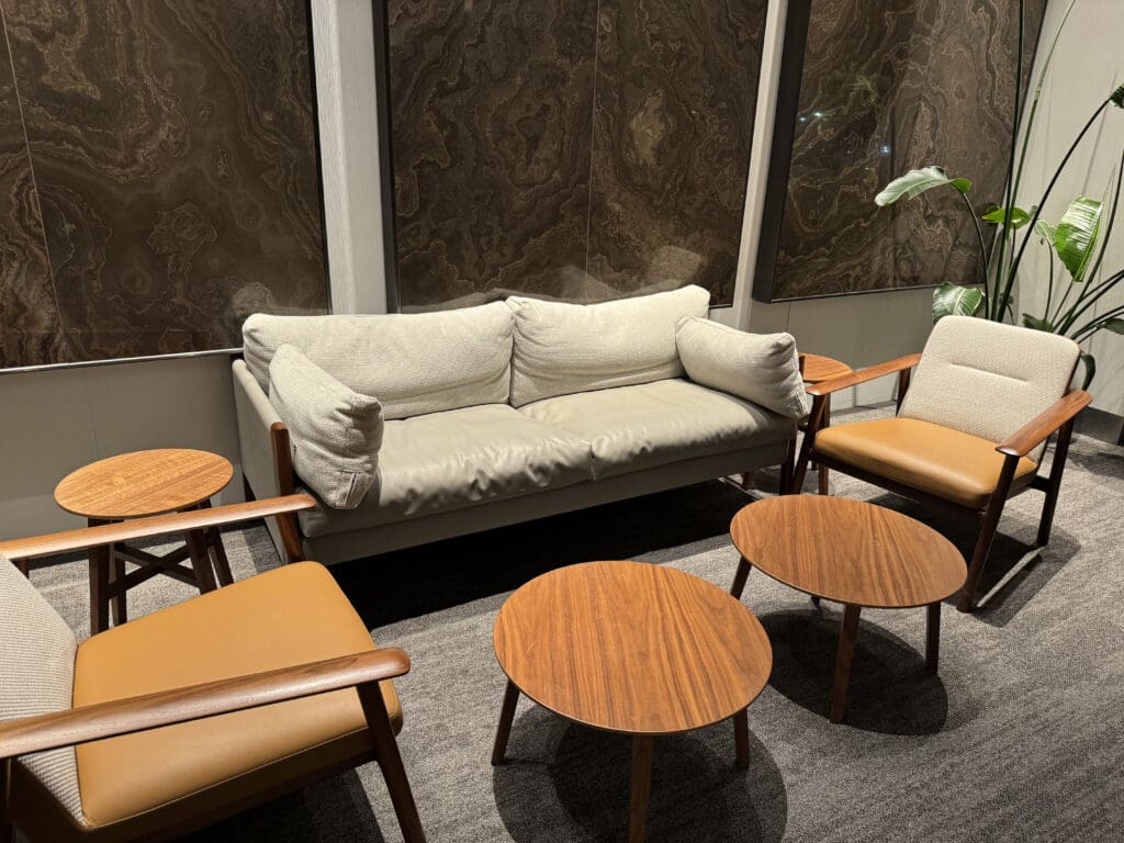 a couch and chairs in a room