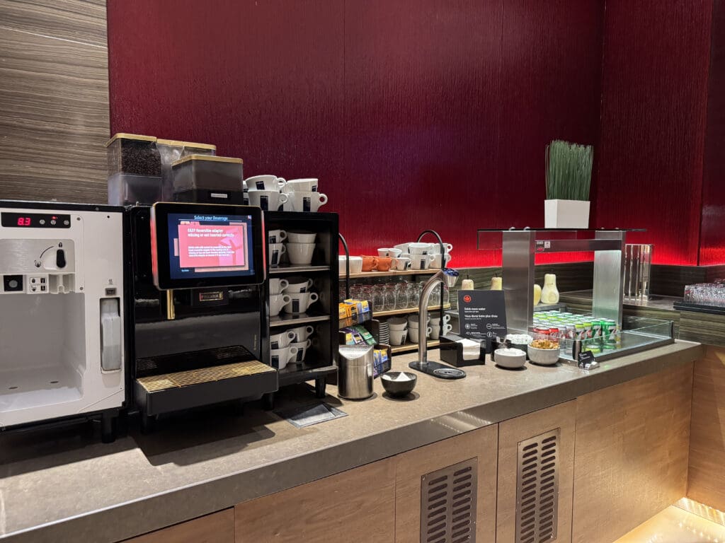 a coffee machine and coffee cups on a counter