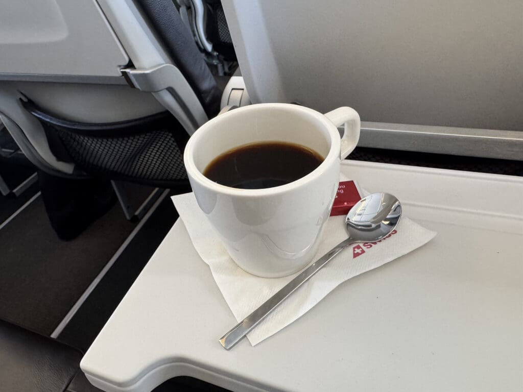 a cup of coffee on a tray