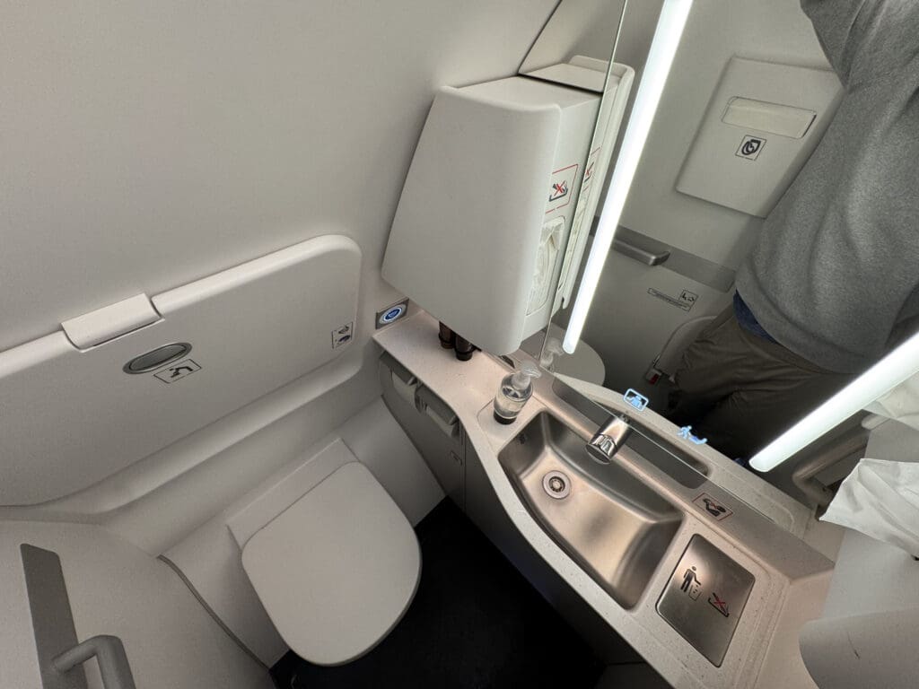 a sink and toilet in a bathroom