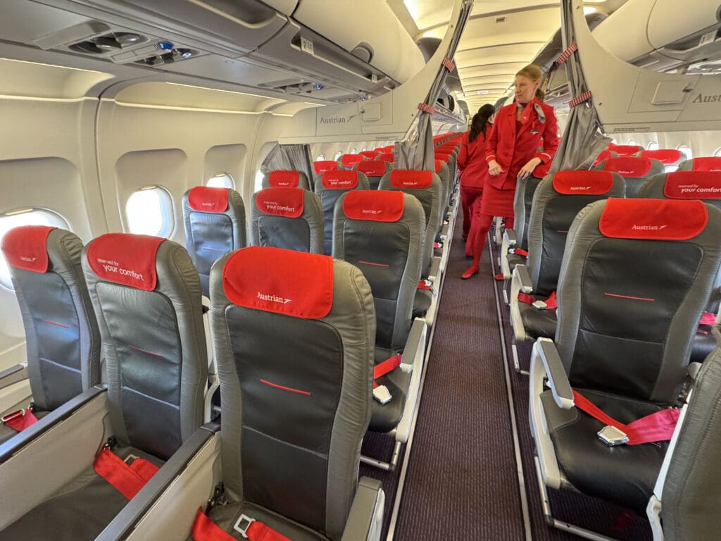 a woman walking on an airplane