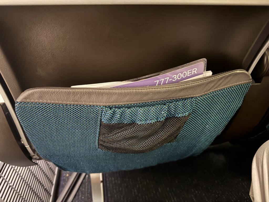 a blue and black bag with a pocket