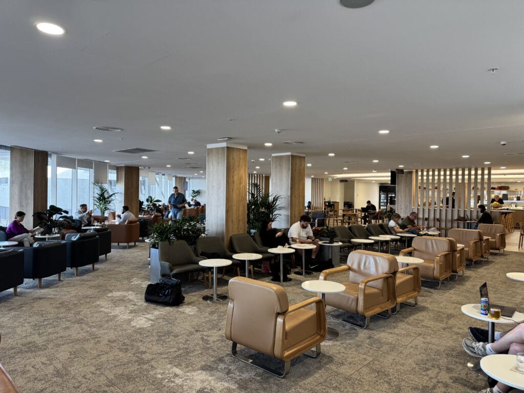 a large room with chairs and tables