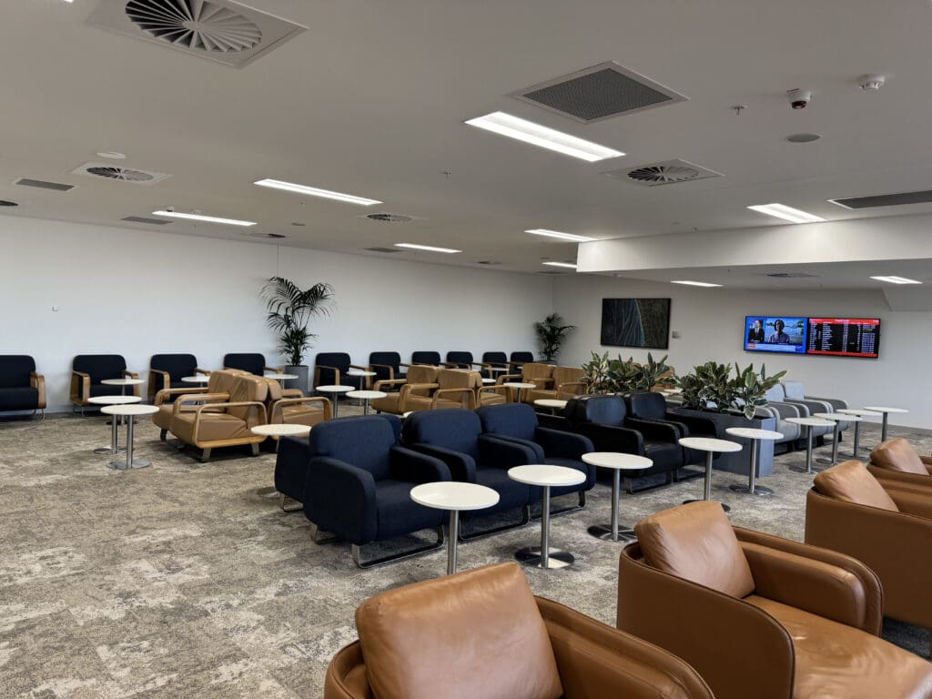 a room with chairs and tables