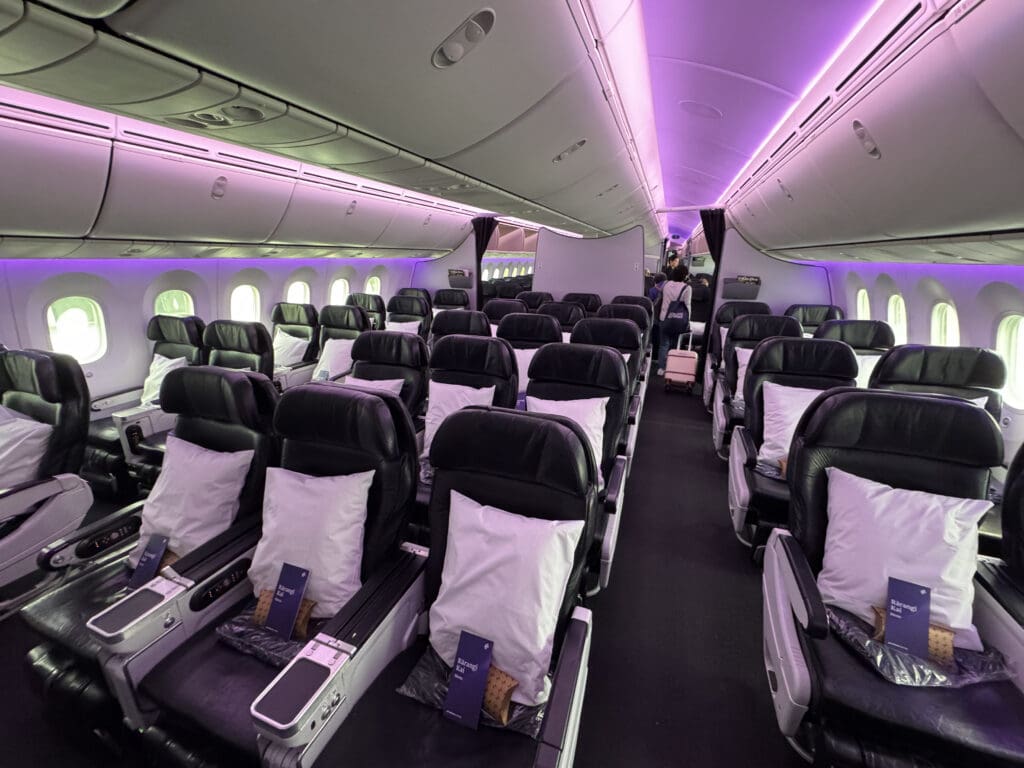 an airplane with purple lights