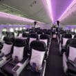 an airplane with purple lights