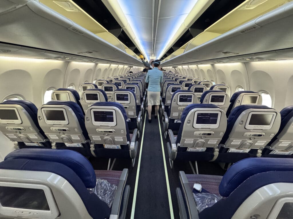 a person standing in an airplane
