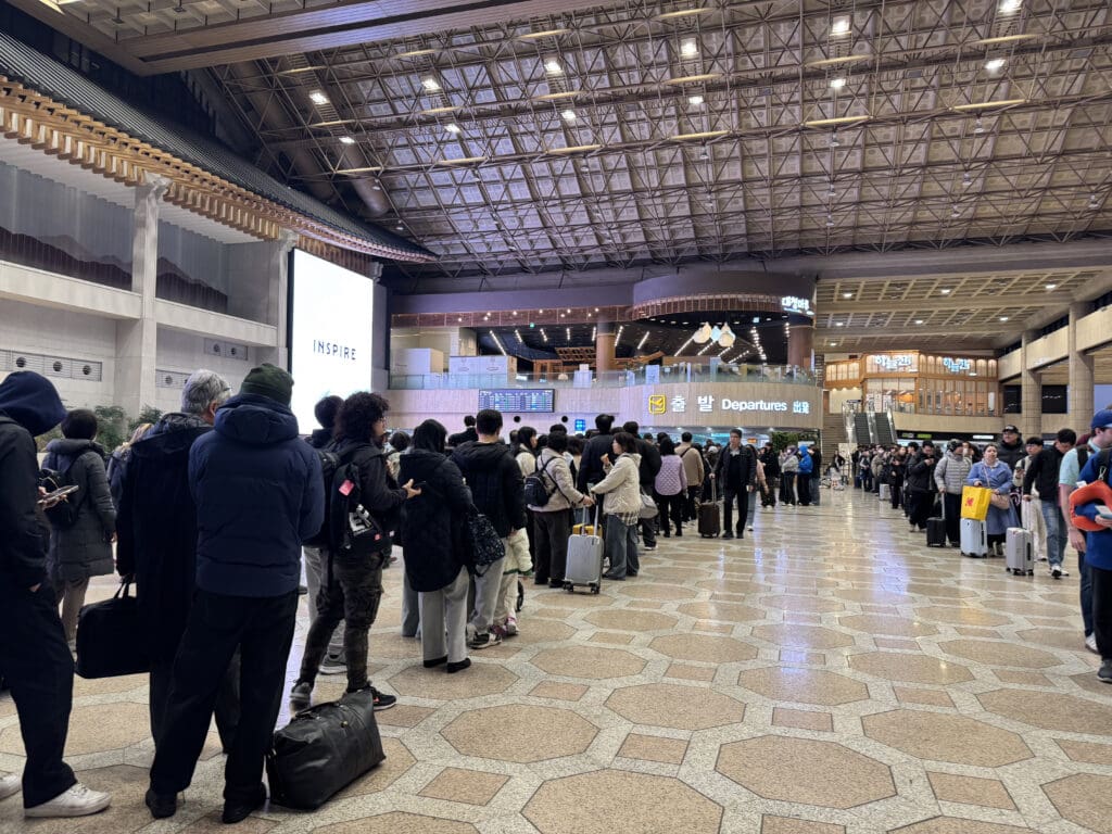 a group of people standing in a line