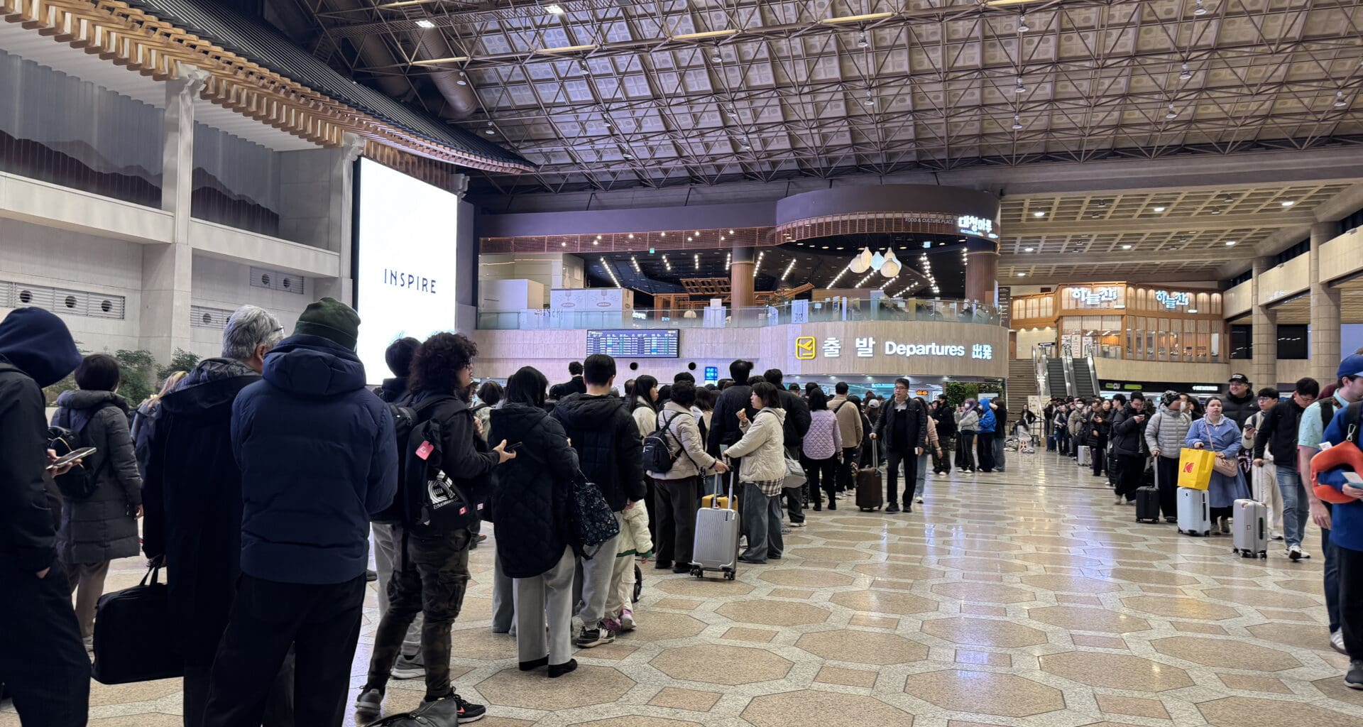 a group of people standing in a line