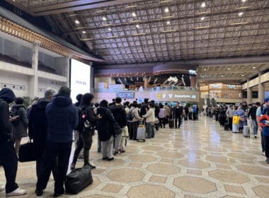a group of people standing in a line