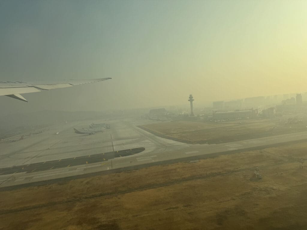 an airplane wing on a runway
