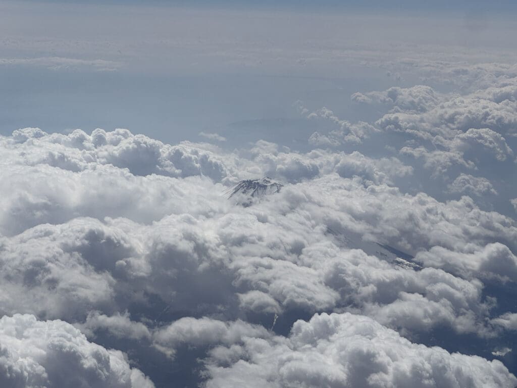 clouds and clouds above a mountain