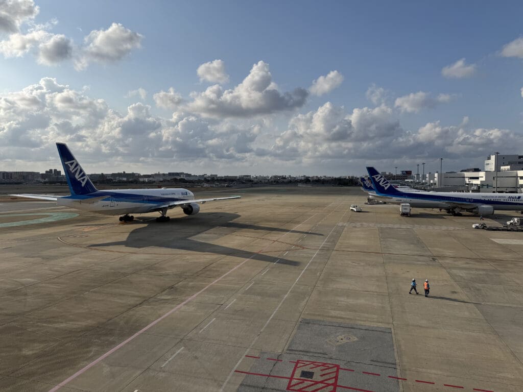 two airplanes on a runway
