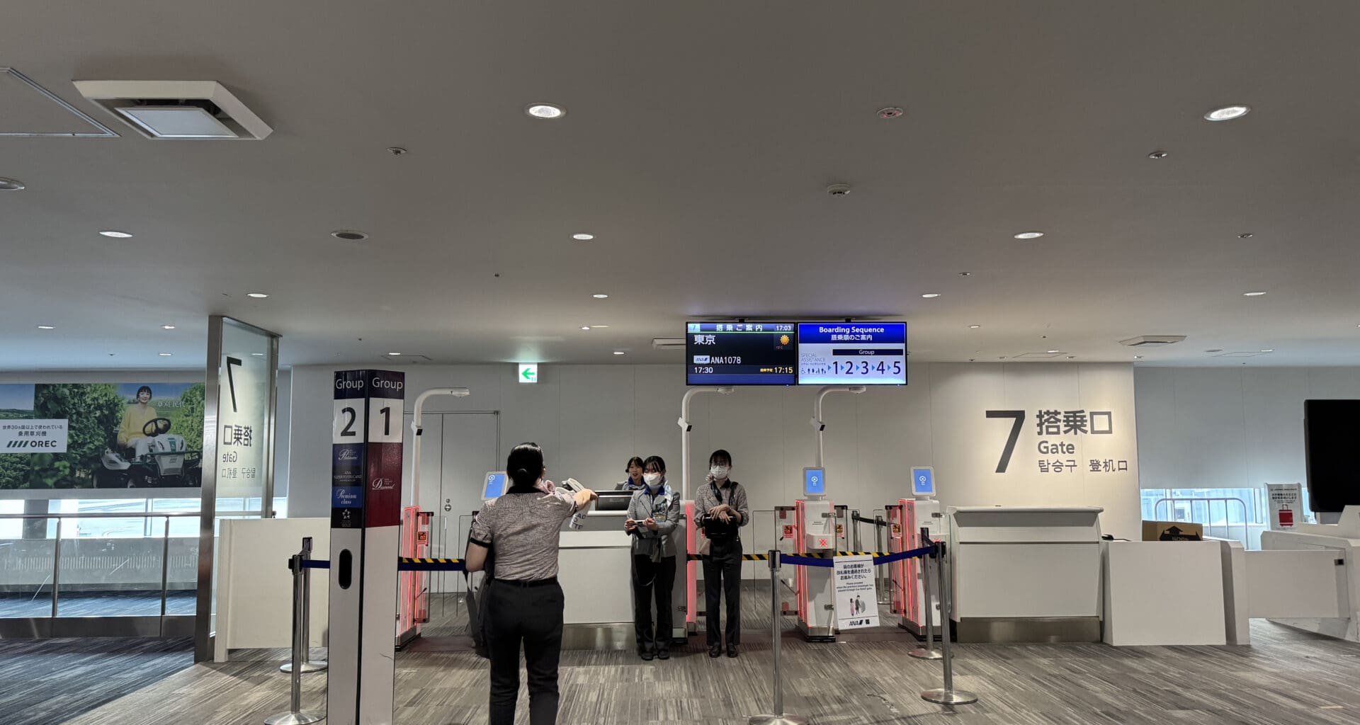 people standing in a line in a building