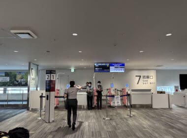 people standing in a line in a building