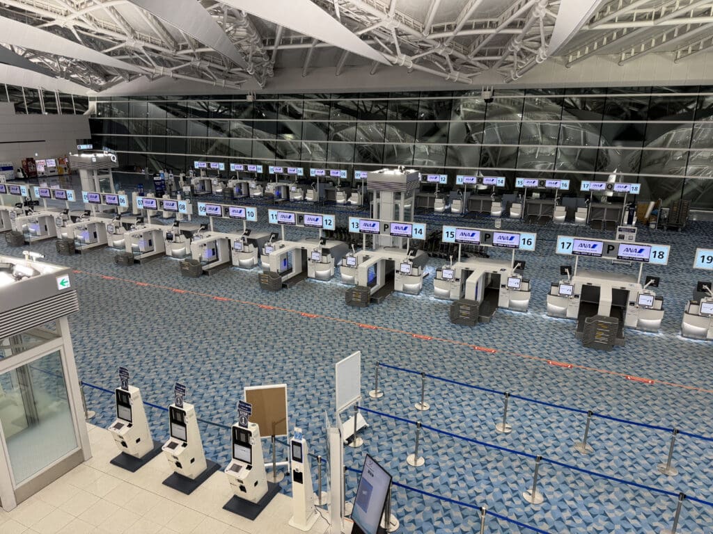 an airport terminal with computers