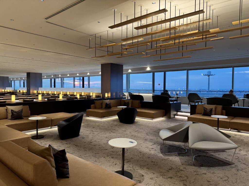 a room with a large window and a large room with a large window