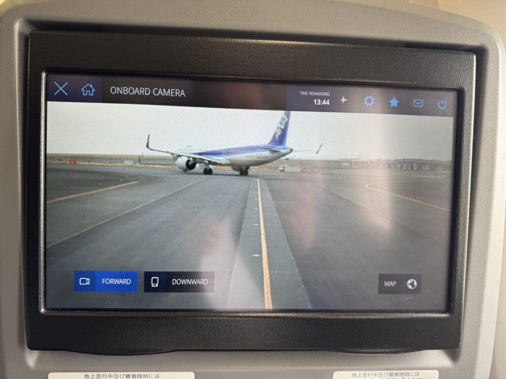 a screen with a picture of an airplane on it